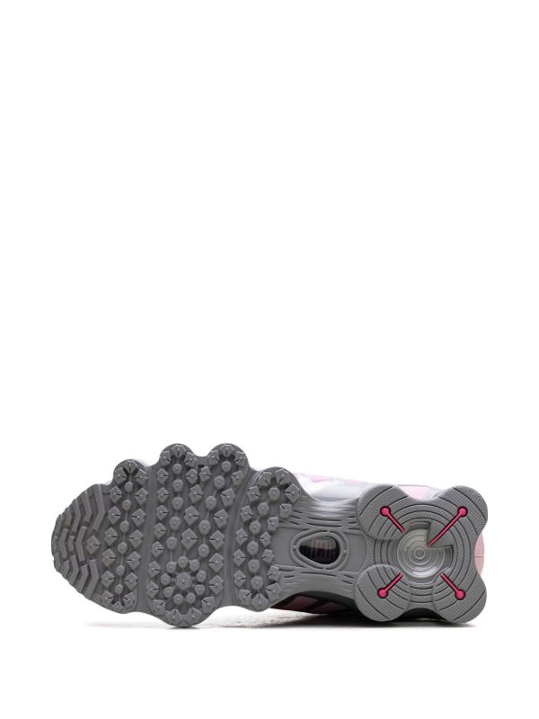 Nike Shox TL sneakers in a Metallic Platinum and Pink Foam