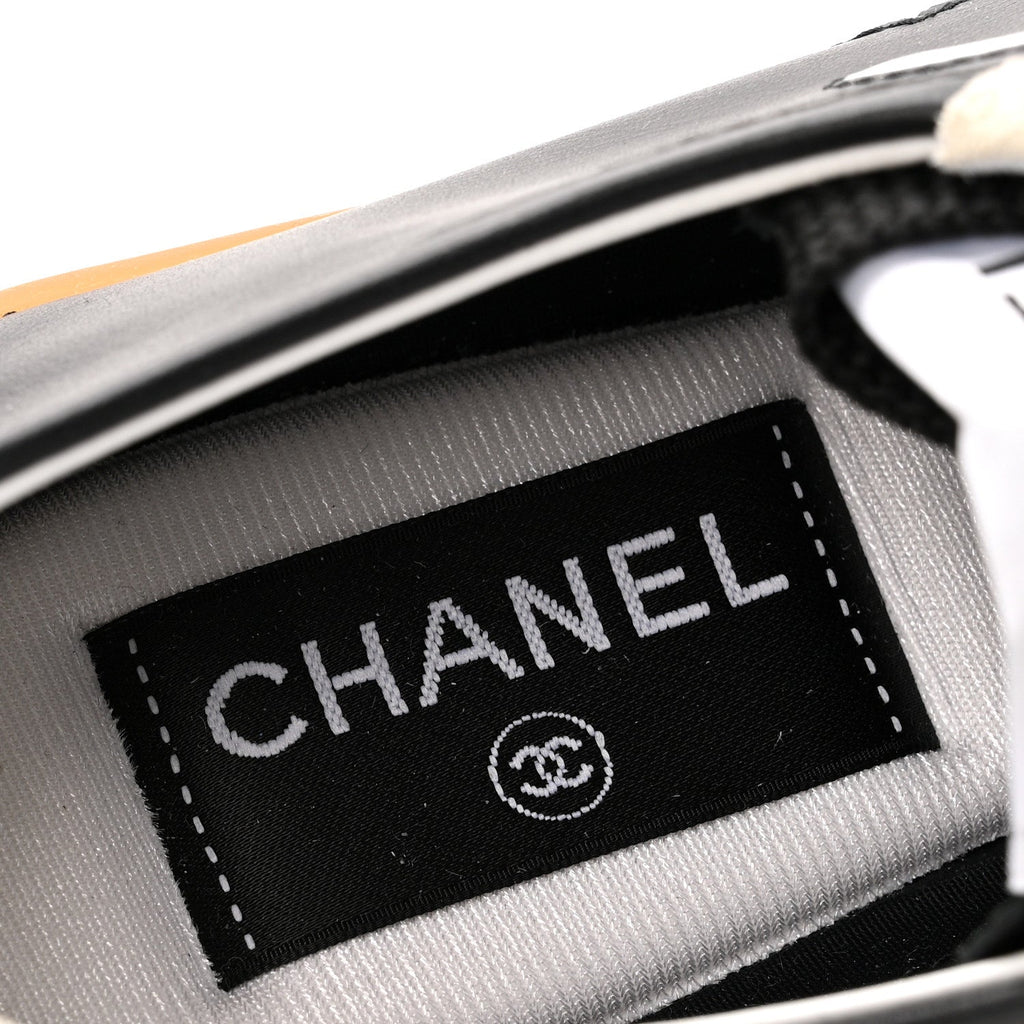 Chanel Calfskin Embossed Suede Womens CC Sneakers  White Black
