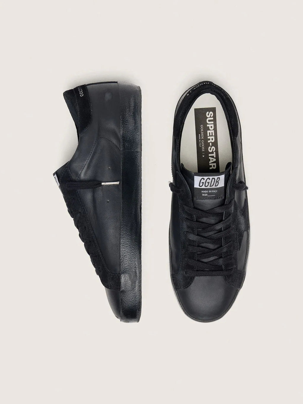 Golden Goose Men's
Super-Star in black nappa with black suede star and heel tab